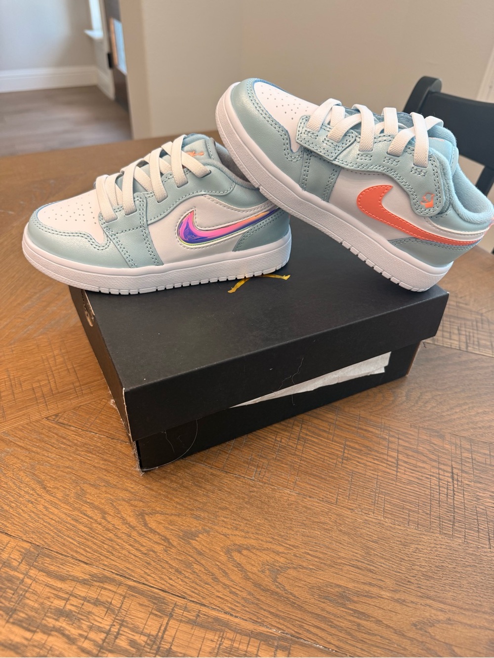 Nike Kids Low-Top Sneakers in Light Blue with Coral and Iridescent Swoosh